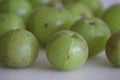 Amla or gooseberries shot on a white background Royalty Free Stock Photo